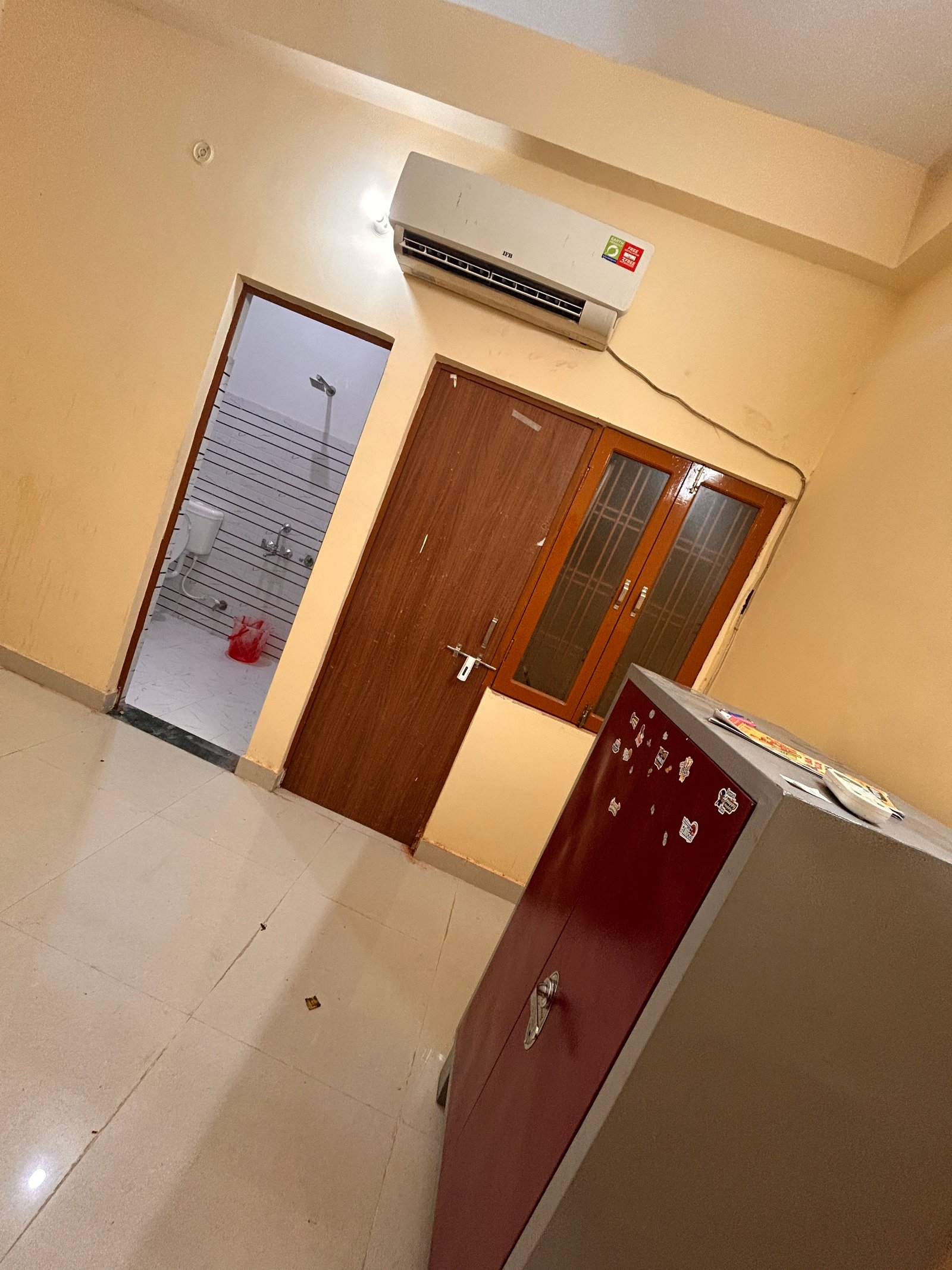 Furnished room with attached washroom